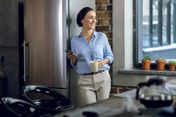 Businesswoman with her refrigerator