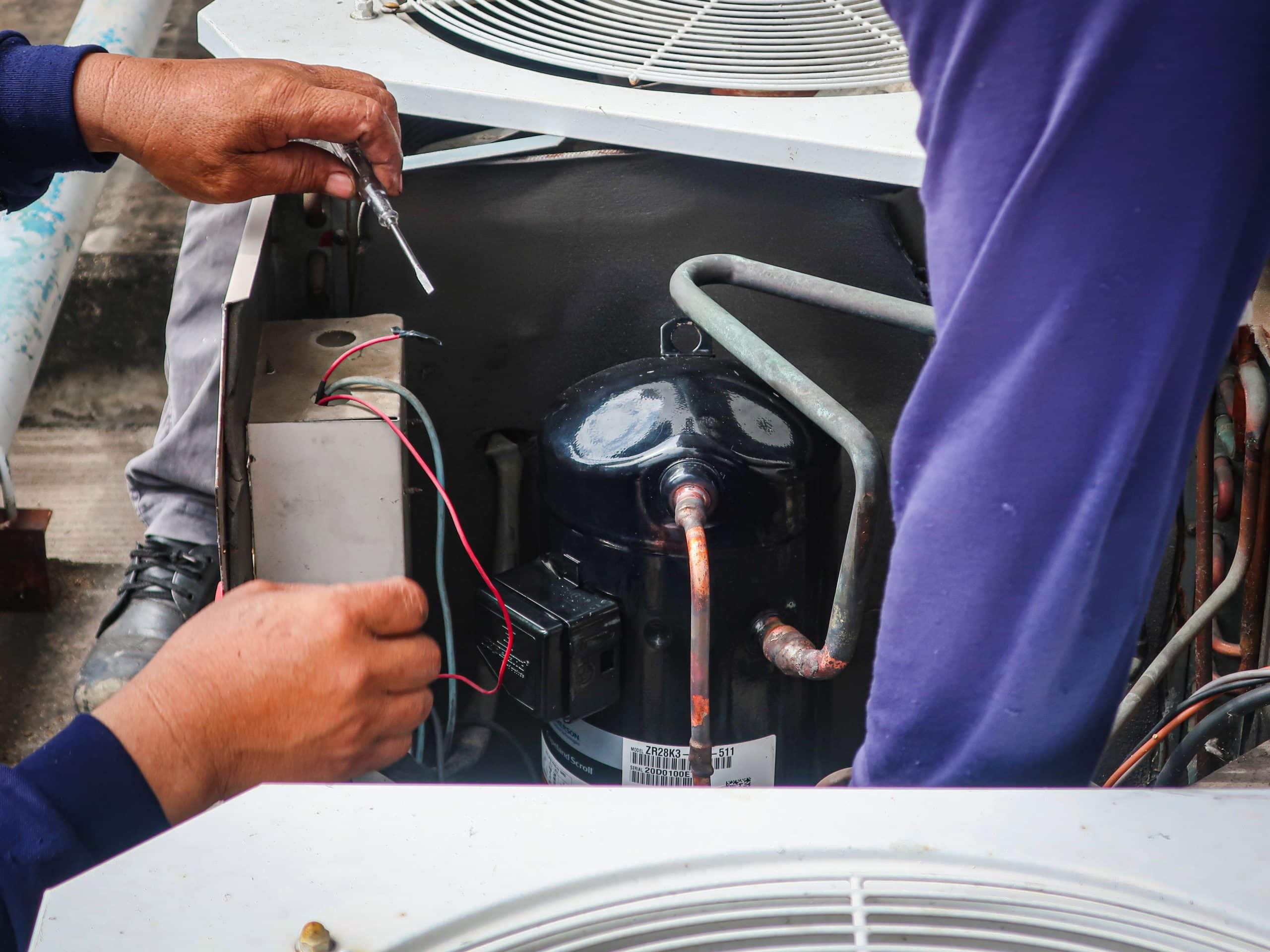 broken AC compressor repair service